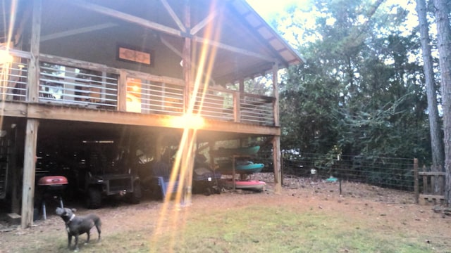 view of side of home with a balcony