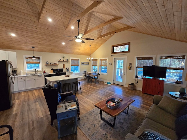 living room featuring hardwood / wood-style flooring and wood ceiling