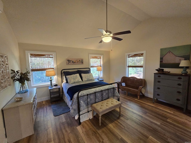 bedroom with ceiling fan, high vaulted ceiling, and dark hardwood / wood-style floors