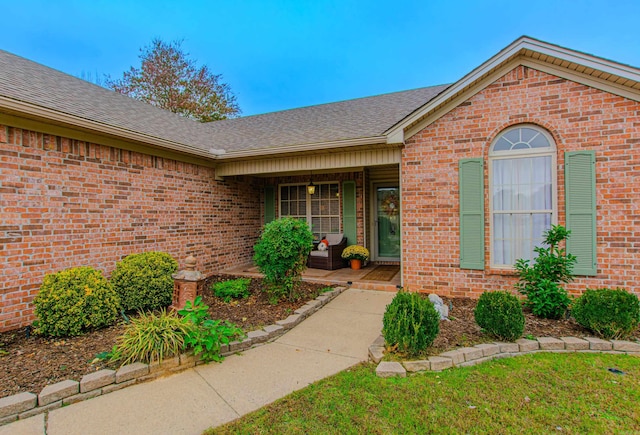 doorway to property featuring covered porch