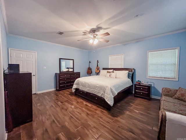 bedroom with dark hardwood / wood-style flooring, ornamental molding, and ceiling fan