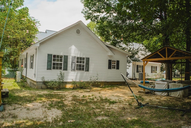 back of house featuring a swimming pool