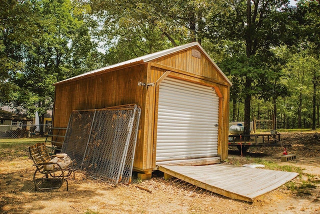 view of outbuilding featuring a garage