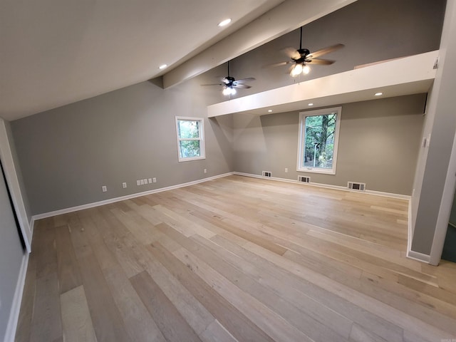 bonus room with plenty of natural light, light hardwood / wood-style floors, and ceiling fan