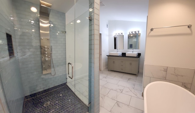 bathroom with tile walls, vanity, shower with separate bathtub, and vaulted ceiling