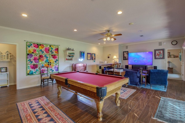 recreation room featuring crown molding, a textured ceiling, dark hardwood / wood-style floors, pool table, and ceiling fan