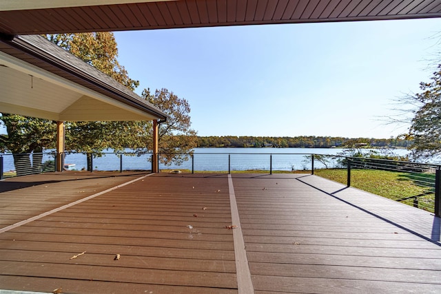 wooden deck with a water view