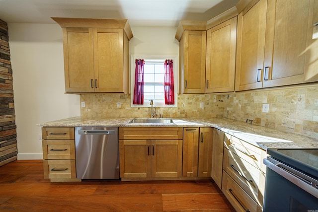 kitchen featuring sink, appliances with stainless steel finishes, tasteful backsplash, light stone countertops, and dark hardwood / wood-style flooring