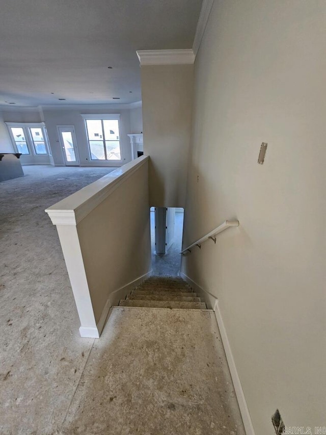 staircase with french doors and ornamental molding