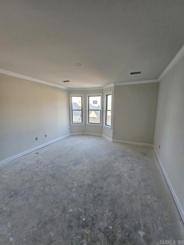 unfurnished room featuring ornamental molding