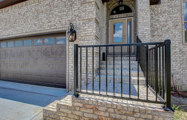 property entrance with a garage