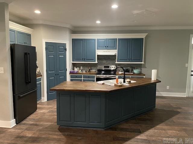 kitchen with stainless steel electric range, wooden counters, black refrigerator, dark hardwood / wood-style flooring, and blue cabinets