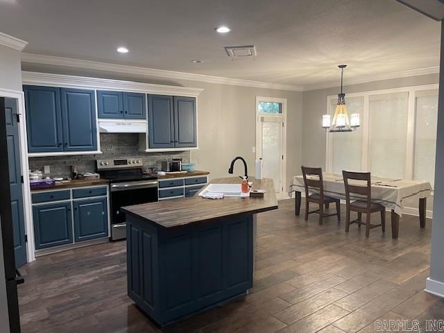 kitchen featuring dark hardwood / wood-style flooring, blue cabinetry, stainless steel range with electric stovetop, and wood counters