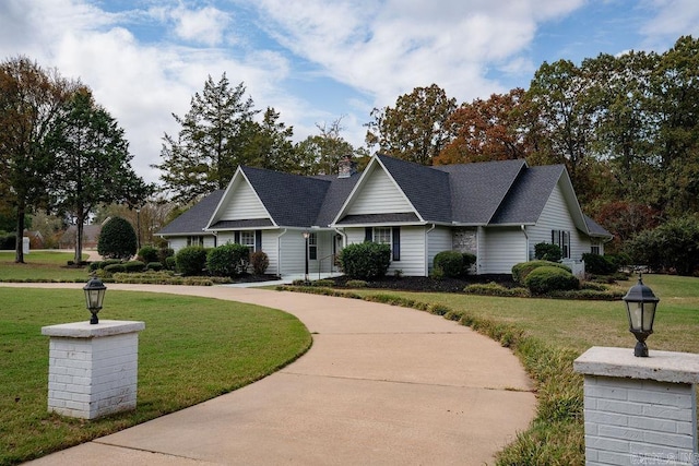 view of front of house with a front lawn