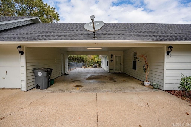 view of parking / parking lot featuring a carport