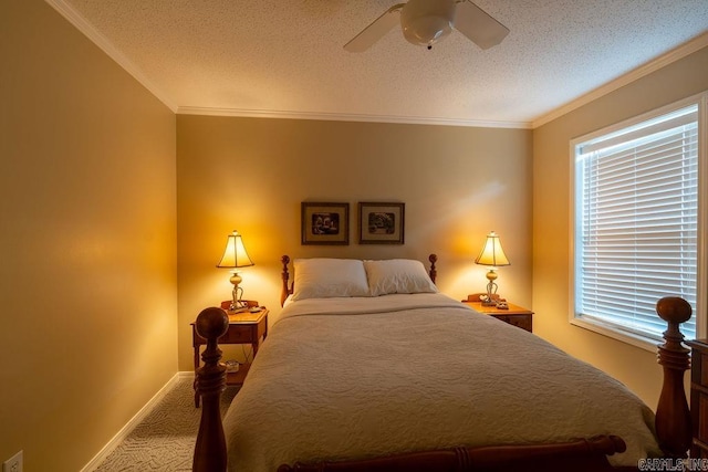 bedroom featuring carpet, ceiling fan, crown molding, and a textured ceiling