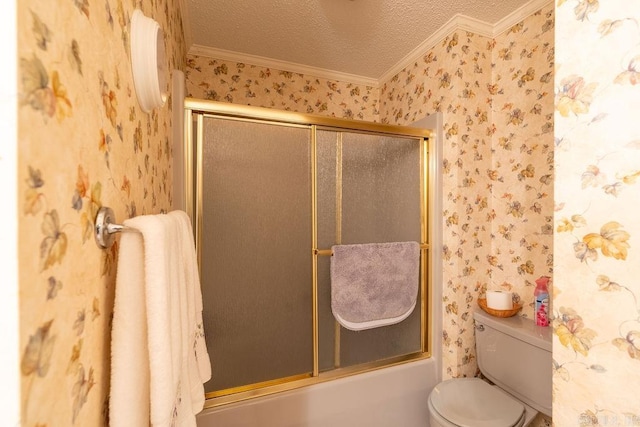 bathroom featuring combined bath / shower with glass door, a textured ceiling, toilet, and ornamental molding