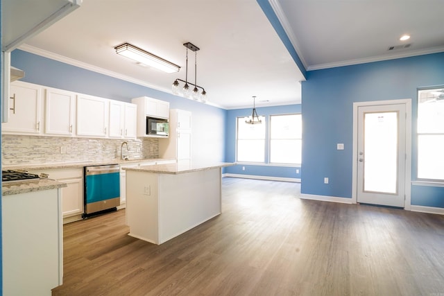 kitchen with dishwasher, white cabinetry, decorative light fixtures, and built in microwave