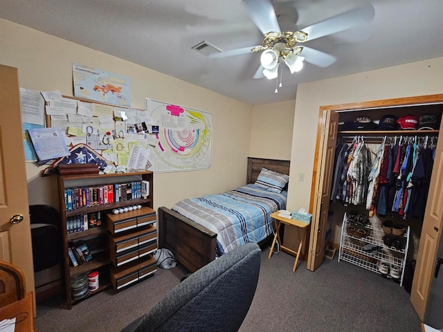 carpeted bedroom with a closet and ceiling fan