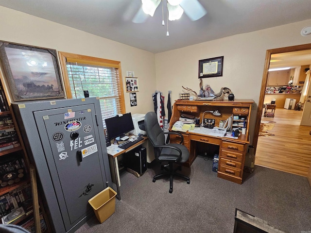 home office with hardwood / wood-style flooring and ceiling fan