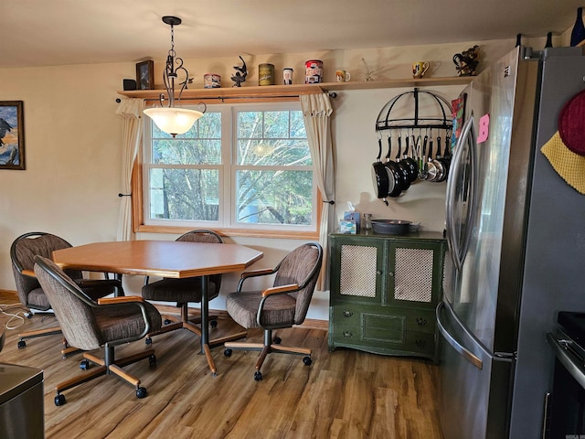 dining area featuring hardwood / wood-style flooring