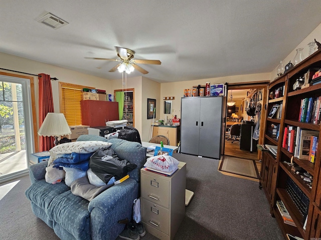 carpeted bedroom featuring access to outside and ceiling fan