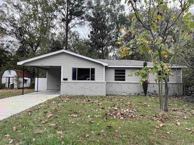 225 Laurel St, Jacksonville, AR 72076 - single story home featuring driveway, a front lawn, an attached carport, and brick siding