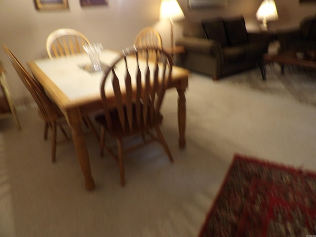 dining area with carpet floors