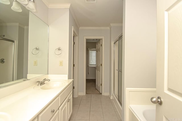 bathroom with vanity, independent shower and bath, tile patterned floors, and ornamental molding