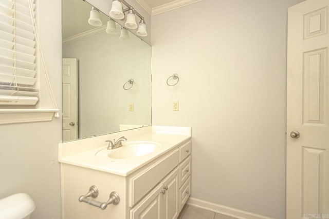 bathroom featuring vanity, tile patterned floors, and ornamental molding