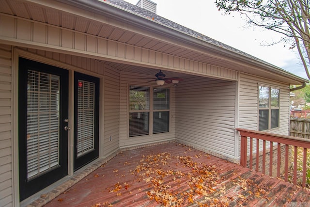 wooden deck featuring ceiling fan