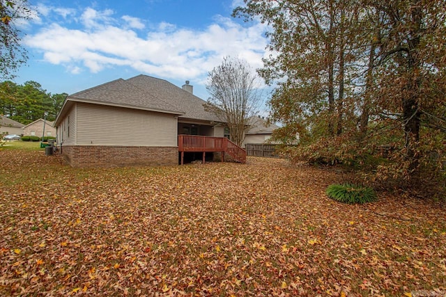 exterior space featuring a wooden deck