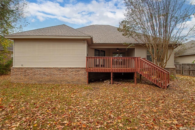 back of house with a wooden deck