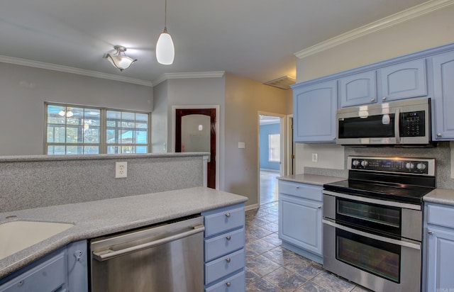 kitchen with blue cabinetry, appliances with stainless steel finishes, crown molding, and plenty of natural light