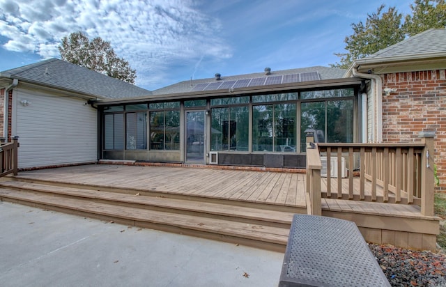 deck featuring a sunroom