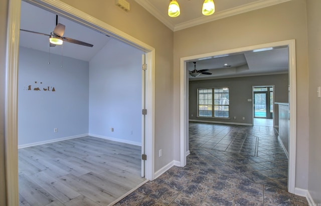 interior space with ornamental molding and hardwood / wood-style flooring