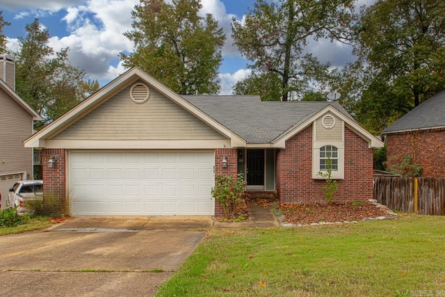 single story home featuring a garage and a front yard