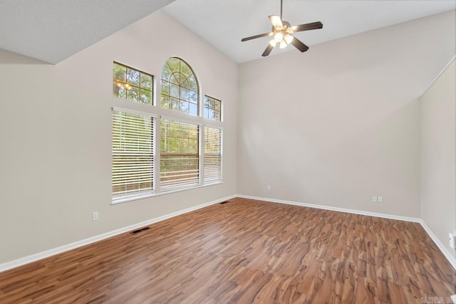 26 Summerwood Cv, Benton, AR 72015 - unfurnished room featuring wood finished floors, baseboards, ceiling fan, and vaulted ceiling