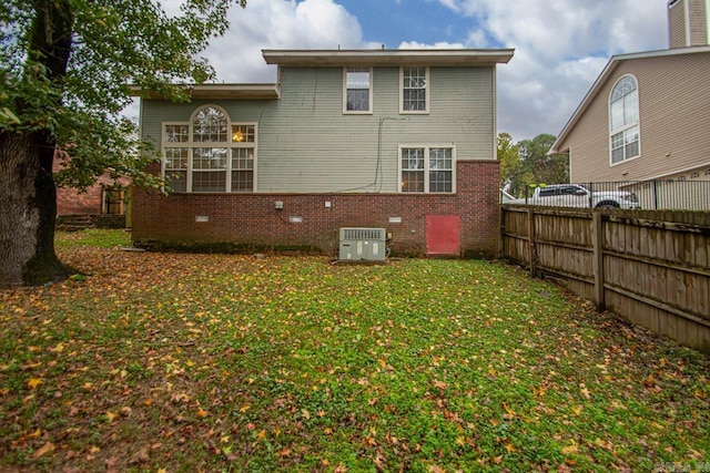26 Summerwood Cv, Benton, AR 72015 - back of house with brick siding, cooling unit, and crawl space