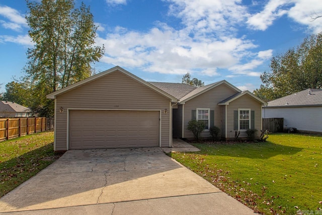 single story home featuring a front lawn and a garage