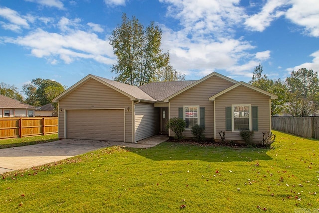 ranch-style home with a garage and a front lawn