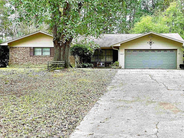 single story home featuring a garage