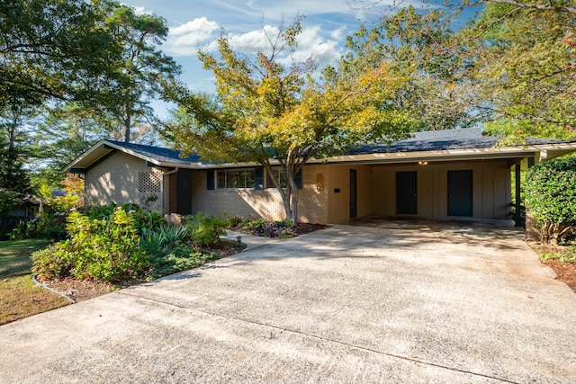 ranch-style home with a carport