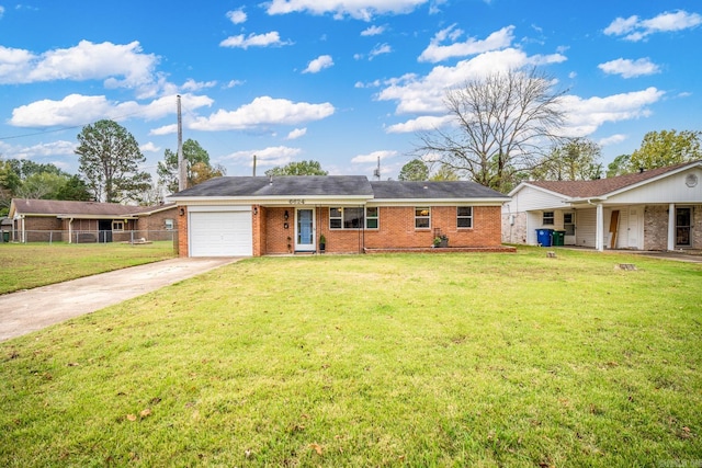 single story home with a garage and a front lawn