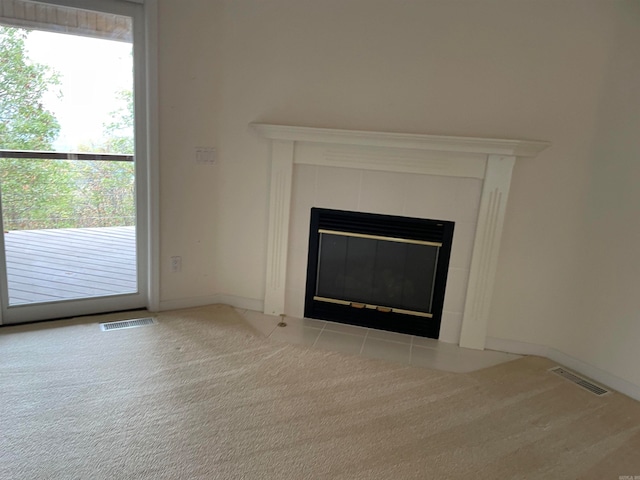 details featuring a fireplace and carpet floors