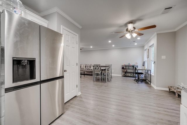 kitchen with white cabinetry, stainless steel fridge, ornamental molding, ceiling fan, and light hardwood / wood-style flooring