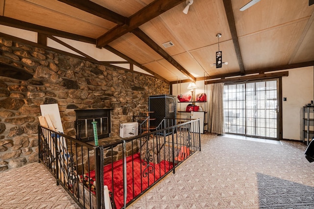 living room with a fireplace, wood ceiling, lofted ceiling with beams, and carpet