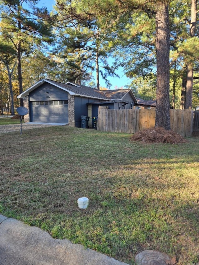 view of yard featuring a garage