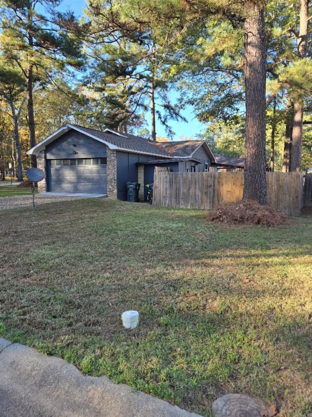 view of yard with a garage