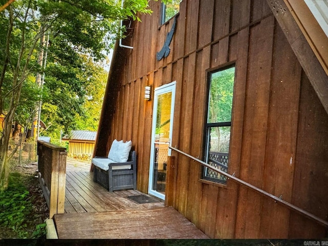 view of home's exterior featuring a wooden deck